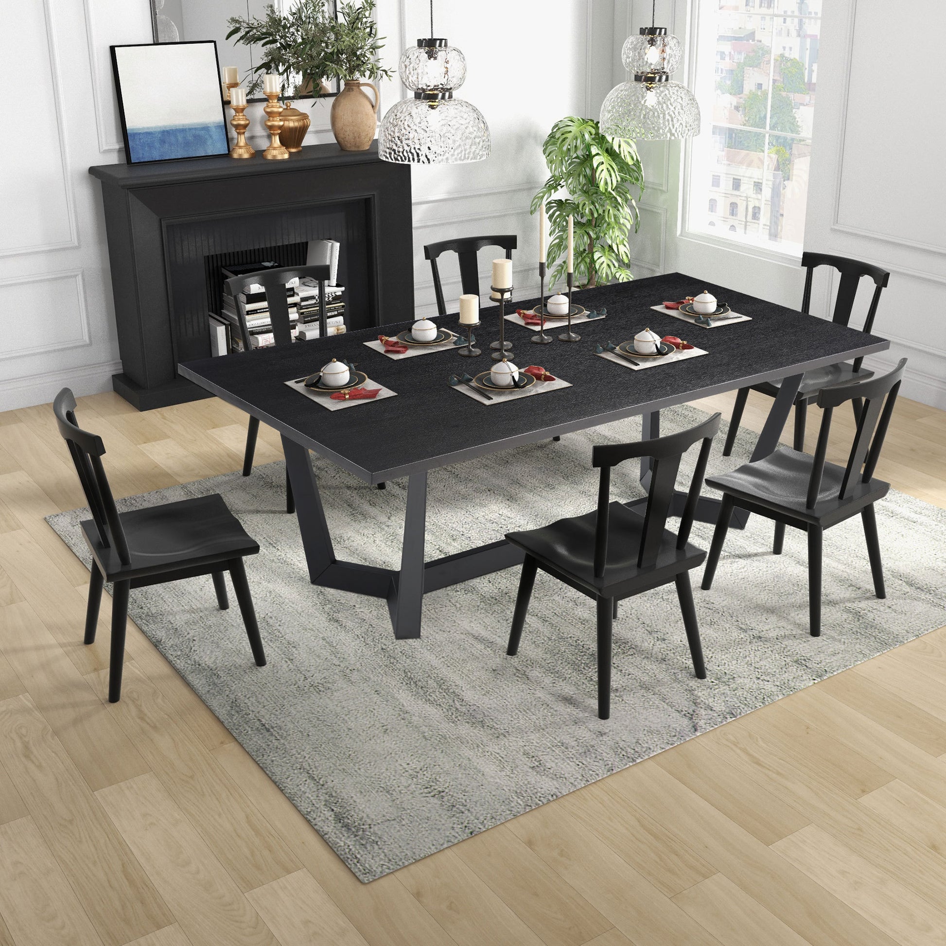 a dining room table with chairs and a rug