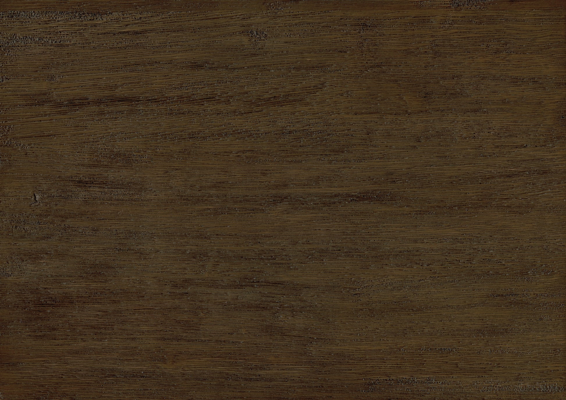 a wooden surface with a brown stain on it