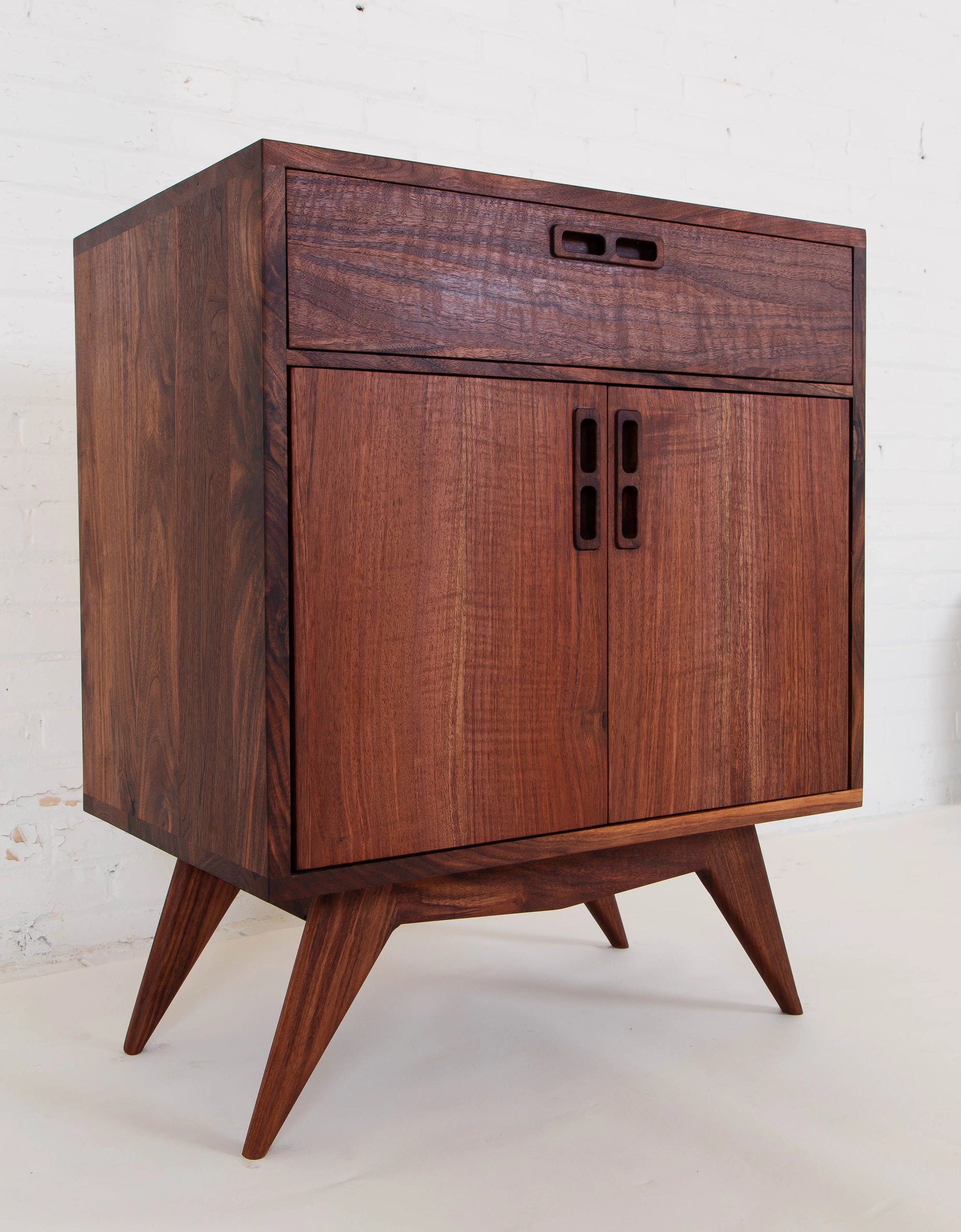 Classic lines and angles of the Mid Century Modern Bar Cabinet