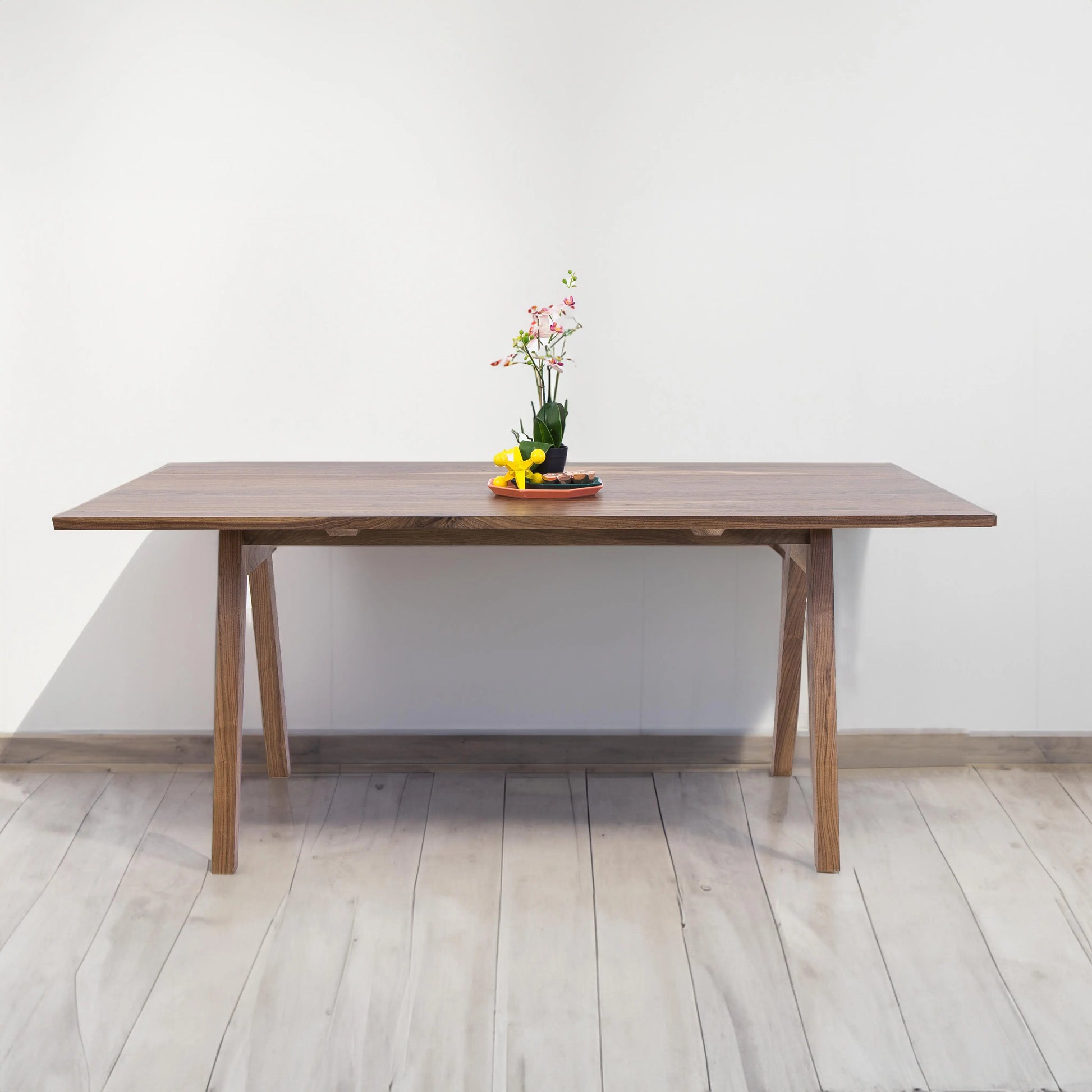 Danish Modern influences in the design of the Sputnik Scandinavian Dining Table