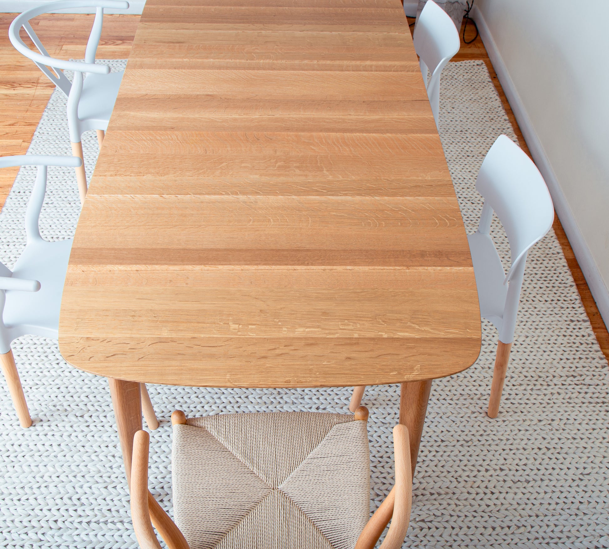 Solid wood dining table in modern Scandinavian design
