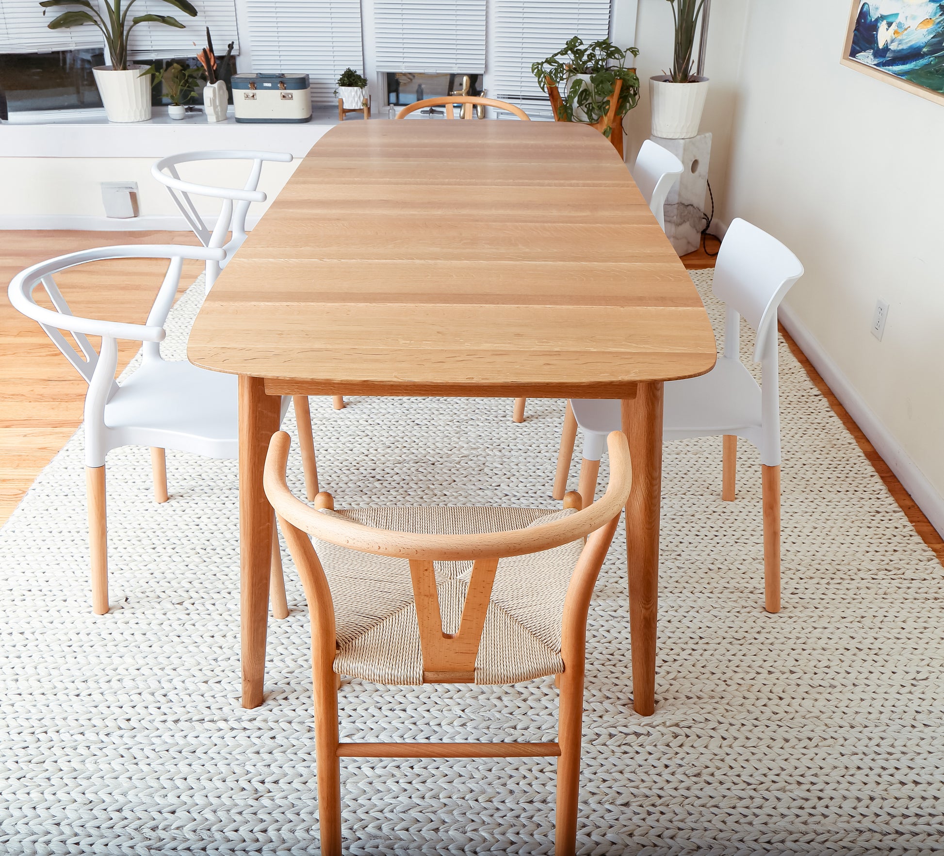 Handcrafted oval dining table made from FSC-certified hardwood
