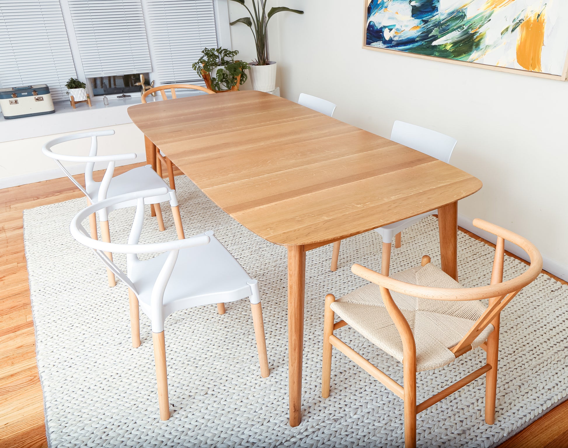 Modern wood dining table with mid-century Scandinavian style
