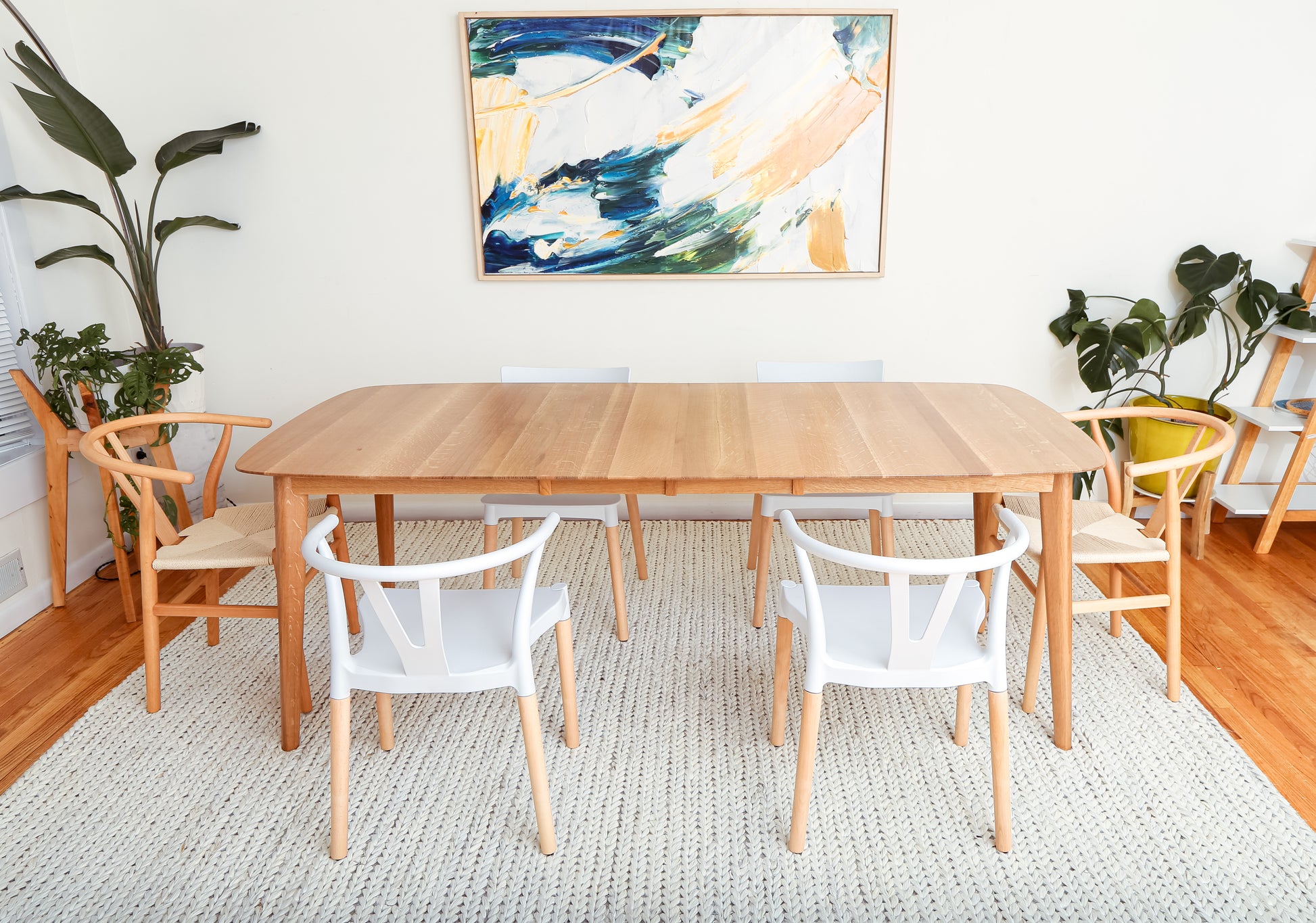 Mid-century modern dining table with oval design for 8 people
