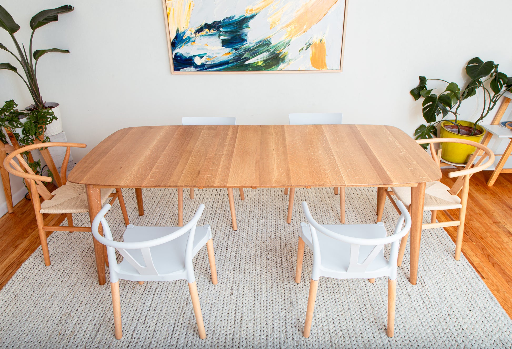 Oval dining table in Scandinavian style for modern dining room
