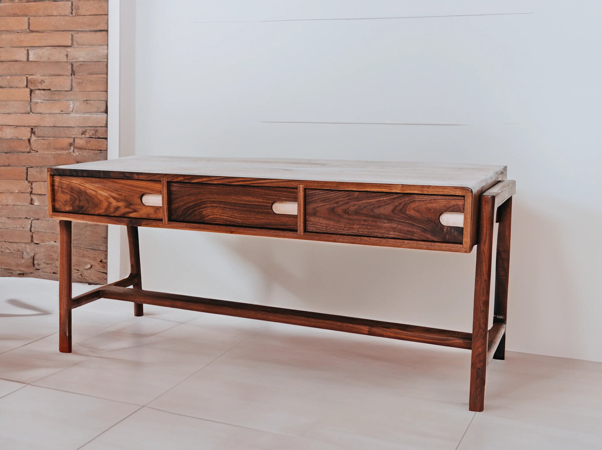 Designer black walnut coffee table Fjord with Scandinavian clean lines and sustainable rock maple detailing.