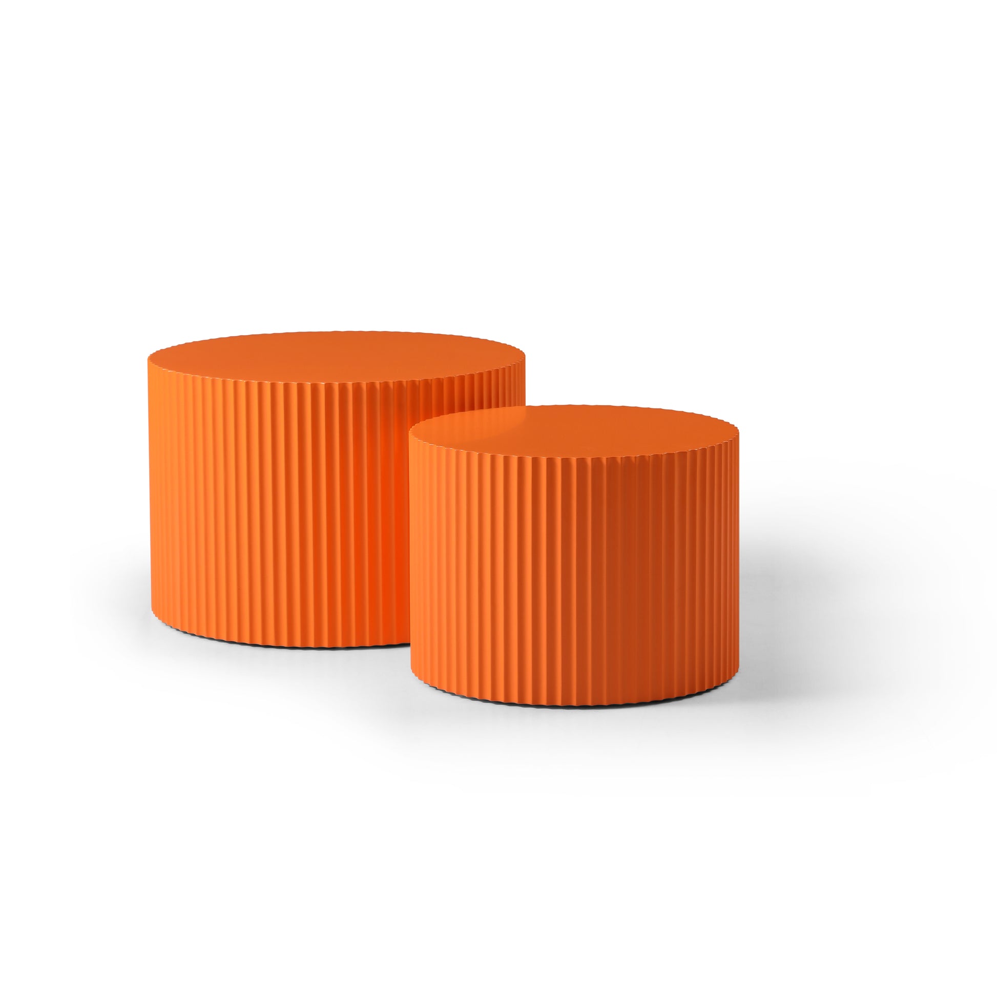 a pair of orange stools sitting next to each other