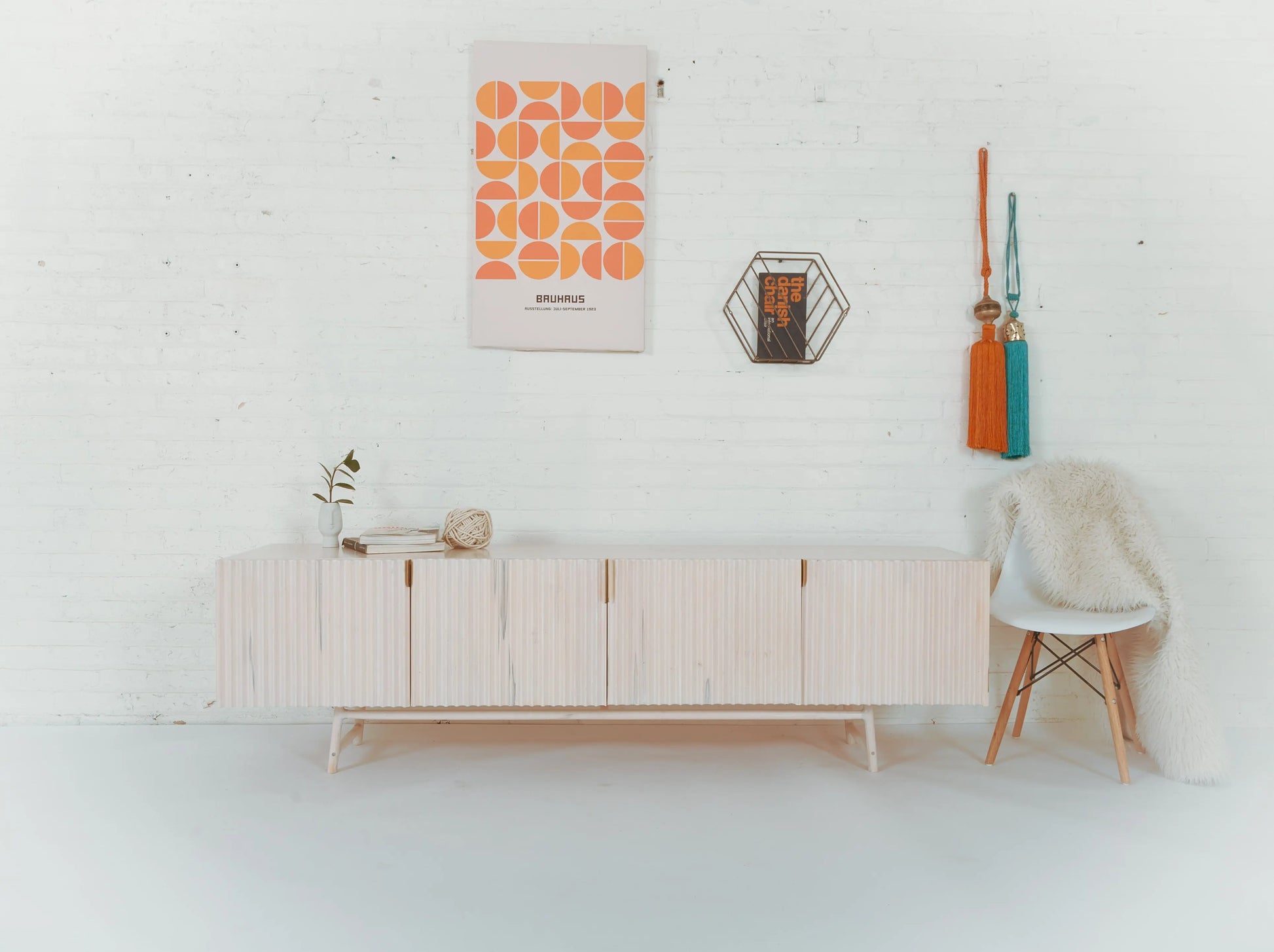 Modern White Sideboard, Front View, White background with Bauhas print.