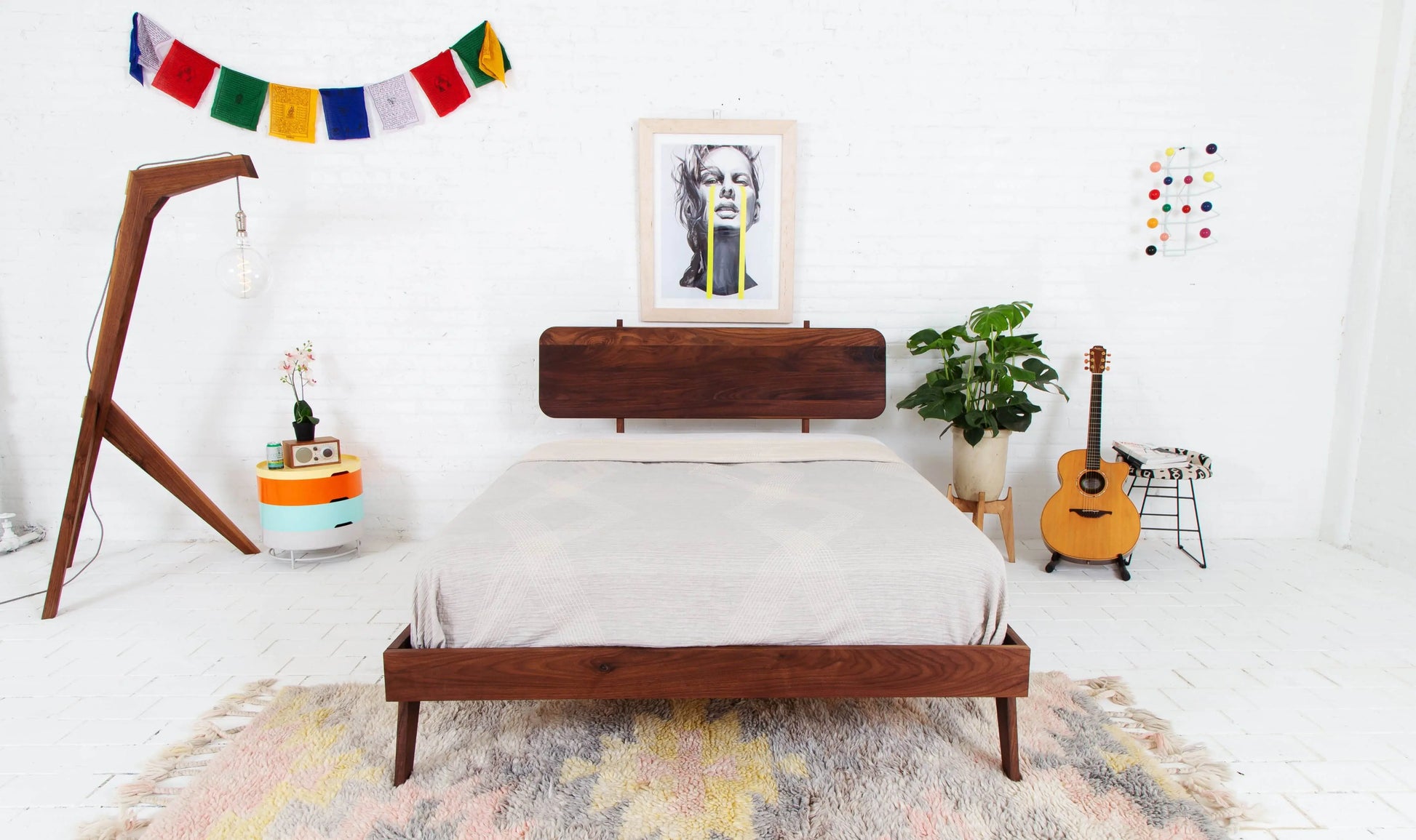 "Designer modern walnut bed frame"