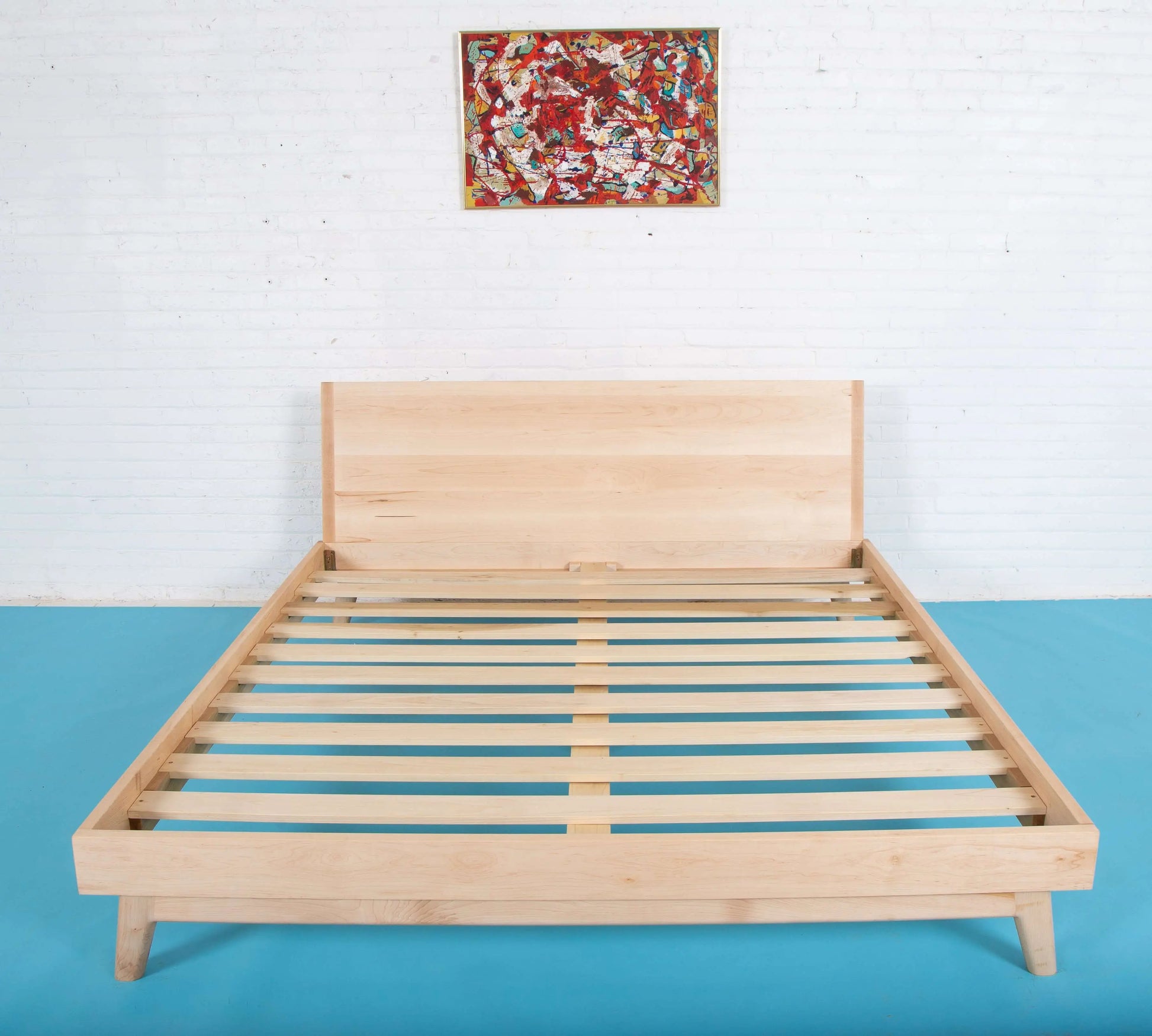 Artisanal Craftsmanship: Handmade Walnut Bed with Mid Century Flair